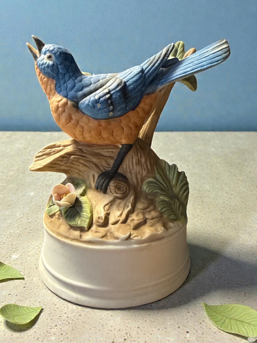 Vintage blue bird music box figurine